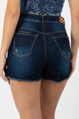 FALDA SHORT EN DENIM CON CREMALLERA DELANTERA Y DESGASTES