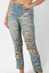 JEAN EN DENIM CON DESGASTES