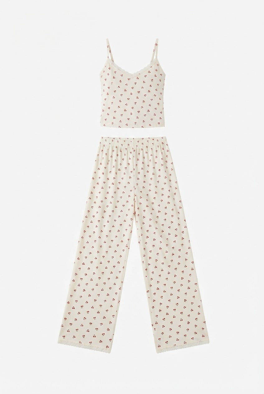 Pijama Ingri para mujer de dos piezas con top de tirantes delgados y pantalón largo holgado con estampado integral.