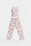 Pijama Vivian para mujer de dos piezas con top de tirantes delgados y pantalón largo holgado con estampado integral y bordes en ondas.