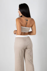 Conjunto de top strapless y pantalón