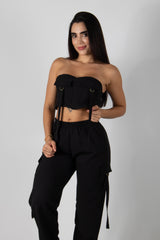 CONJUNTO DE TOP STRAPLESS Y PANTALÓN TIPO CARGO