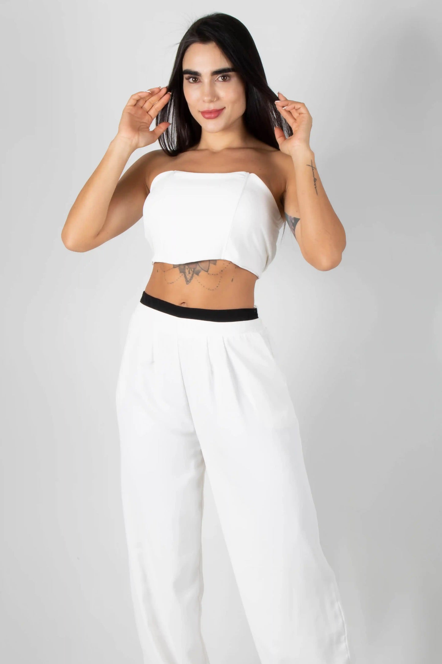CONJUNTO DE CROPTOP TIPO CORSET Y PANTALON CON ELONGACION