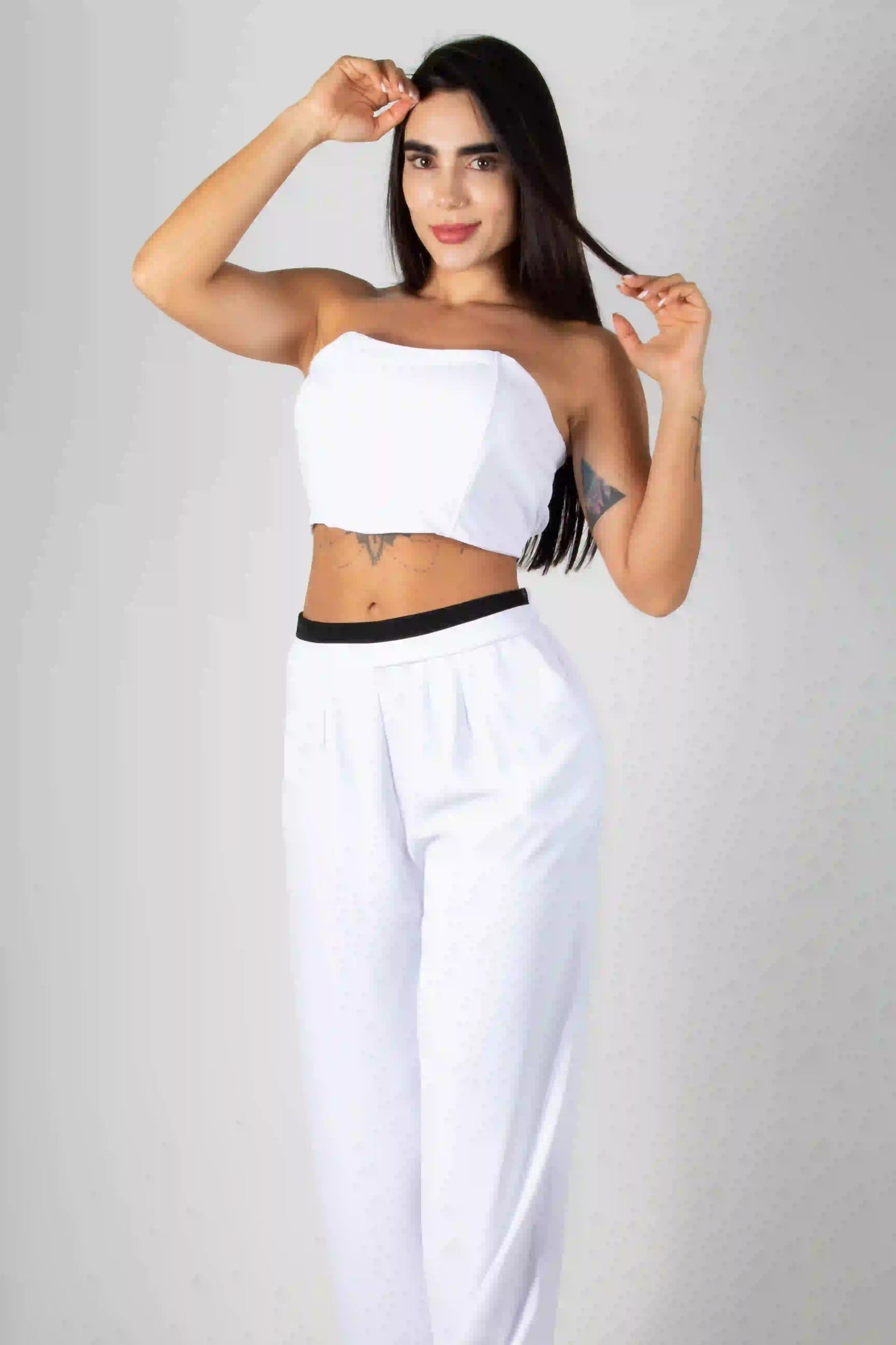 CONJUNTO DE CROPTOP TIPO CORSET Y PANTALON CON ELONGACION