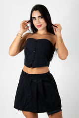 CONJUNTO CON FALDA PLIZADA Y CROP TOP CON ELONGACION POSTERIOR