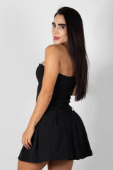 VESTIDO STRAPLESS CON FALDA PLIZADA